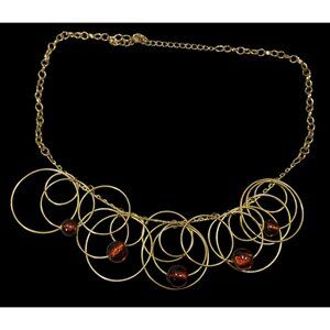 Modern Gold Tone Loop Necklace With Brown Beaded Accents